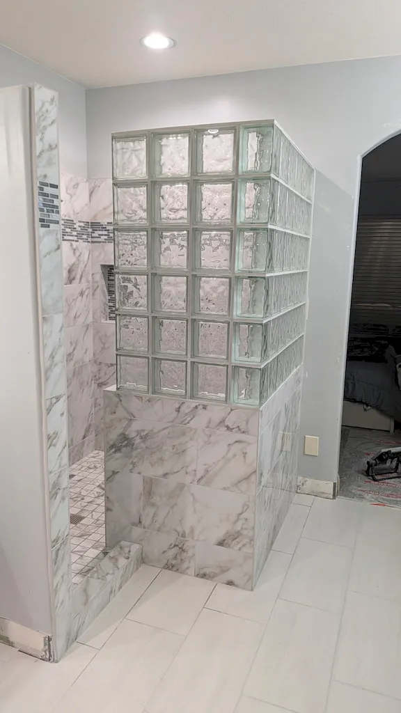 Tile shower and bathroom flooring installation by Red Rock Flooring